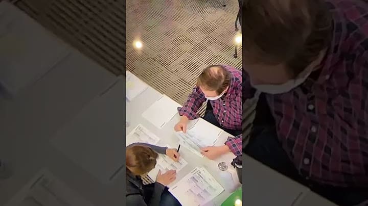Woman filling in Blank Ballots - Election Fraud